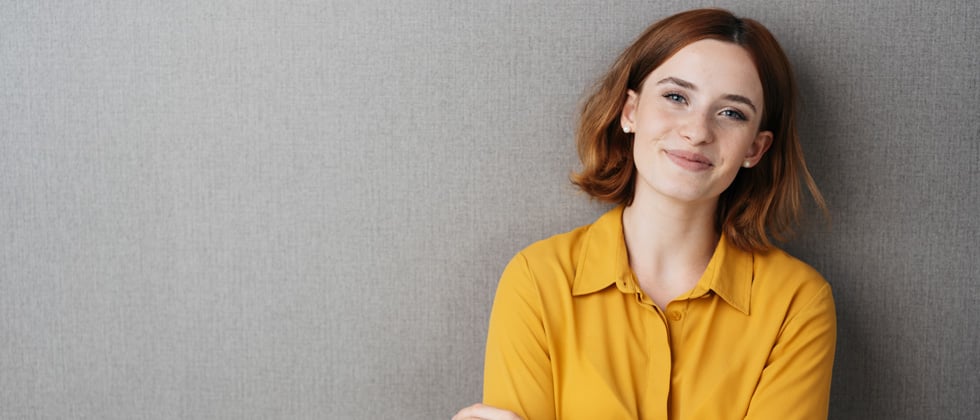 Woman hugging man from behind as a symbol of how to find the right person