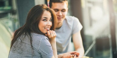 Man smiling at woman as a symbol for dating advice for men